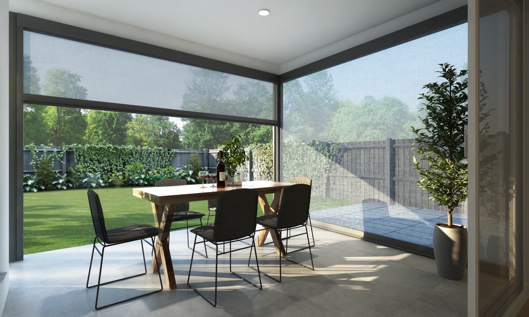 A covered patio with Clara exterior shades lowered against low sun.